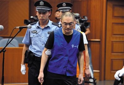 去年9月16日，韓磊被帶進法庭受審。 新京報記者 王貴彬 攝